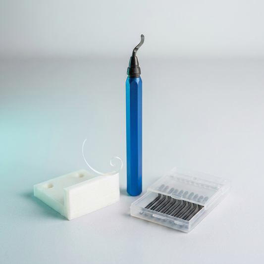 Cube 3D Print Deburring Tool with blade case and freshly deburred 3D printed part